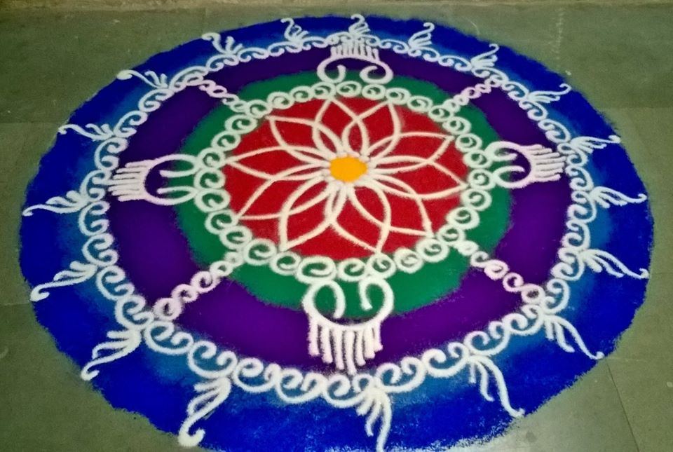 Blue and pink concentric rangoli
